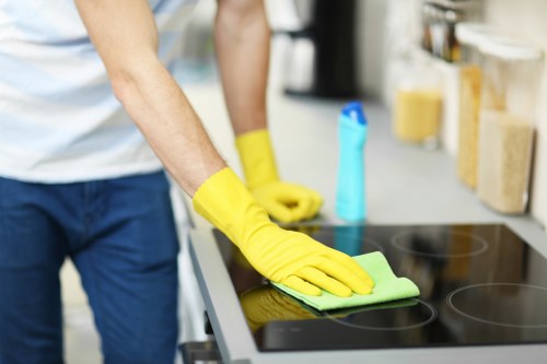 Technicians using advanced equipment for facade cleaning