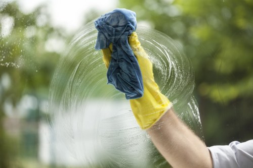 Trained cleaning staff maintaining office cleanliness