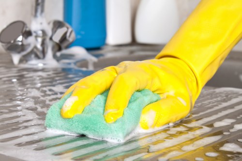 Expert carpet cleaner treating a stain